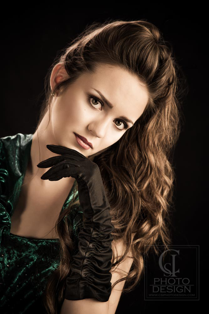 Model-on-black-background-wearing-black-gloves