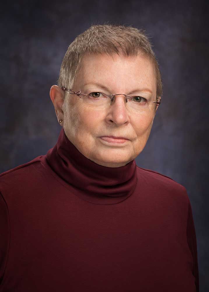 professional headshots of author Nancy Weston for her book Ice in the Guise of Fire