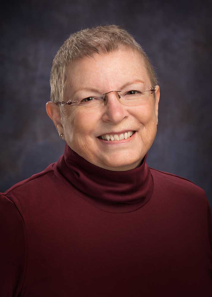 professional headshots of author Nancy Weston